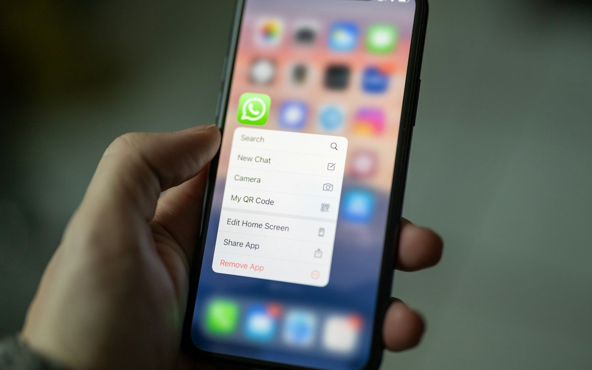 Smartphone receiving instant direct WhatsApp customer lead notifications